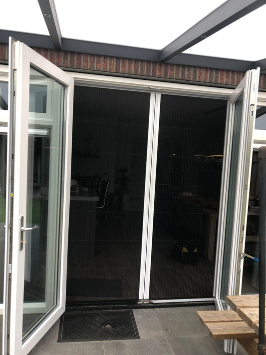 Plissé hordeuren voor deuren in Oldenzaal